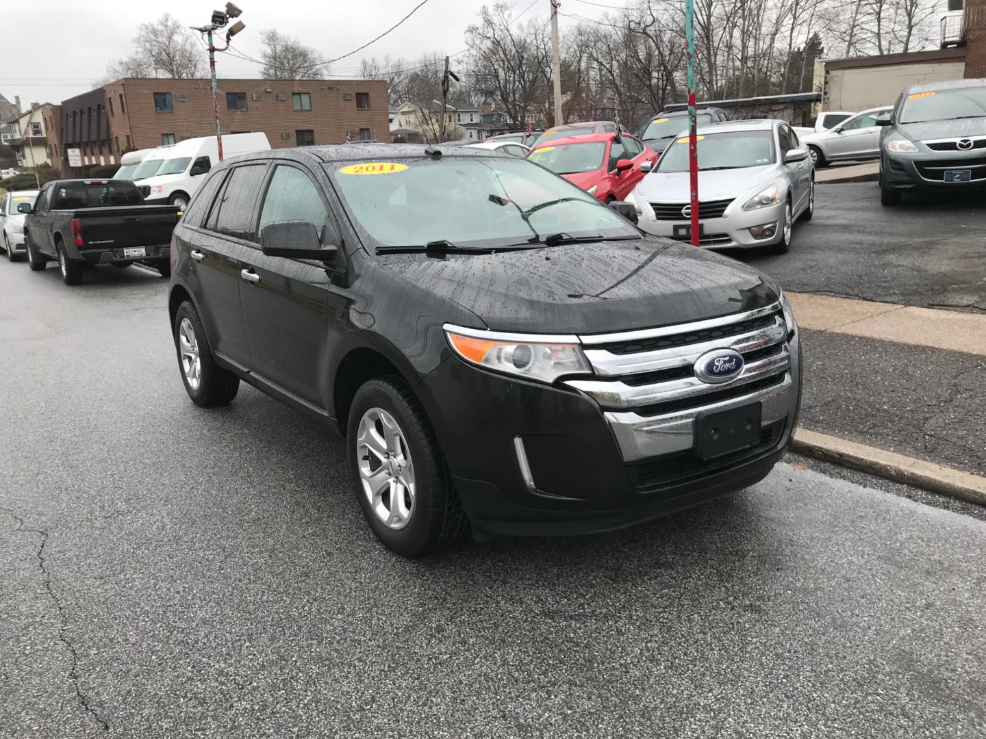 2011 Black /Cream Ford Edge SEL (2FMDK3JCXBB) with an 3.5 V6 engine, Automatic transmission, located at 577 Chester Pike, Prospect Park, PA, 19076, (610) 237-1015, 39.886154, -75.302338 - Photo#2